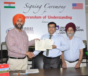 While Exchanging MoU's at Global Institutes, Amritsar